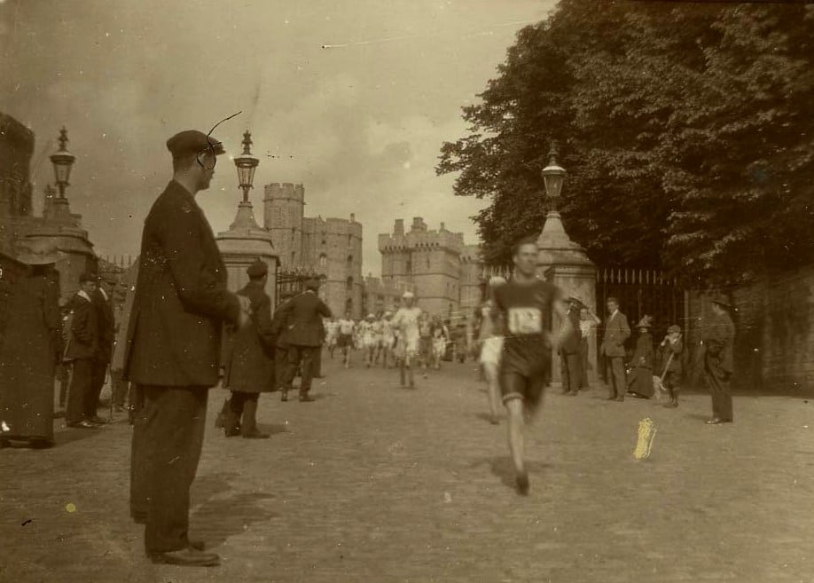 Olympic athletes running past Windsor Castle in 1908.