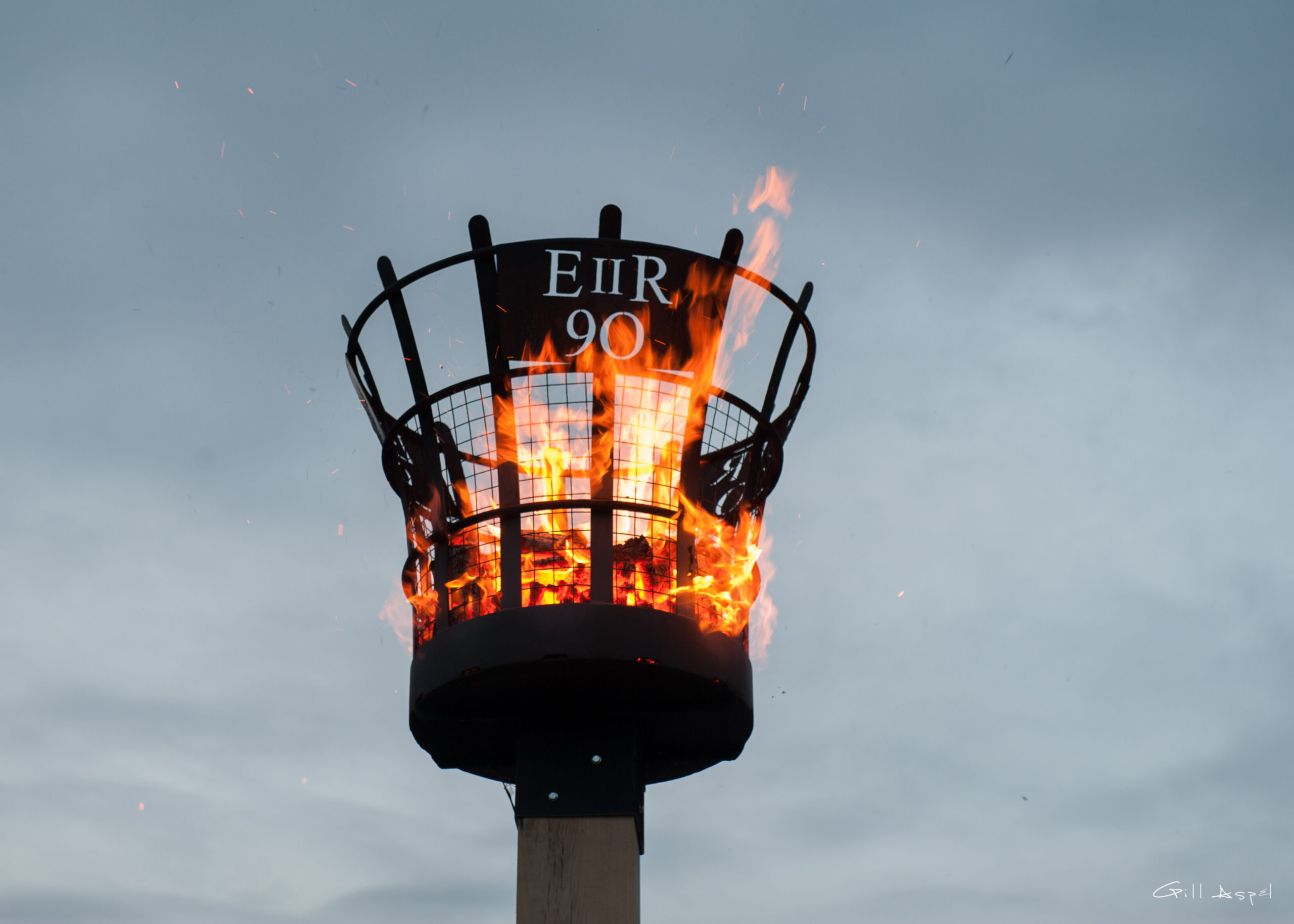A fiery beacon.The raised basket bears the inscription, E II R 90.