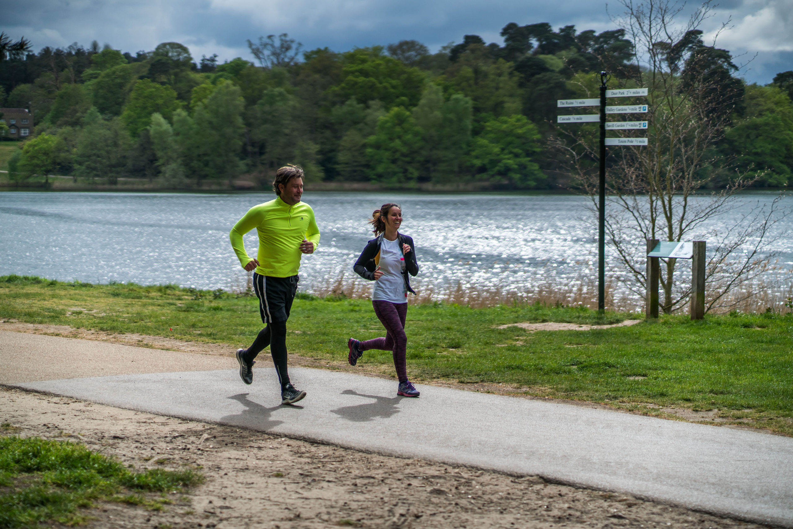 Two runners at Virginia Water, Windsor Great Park.