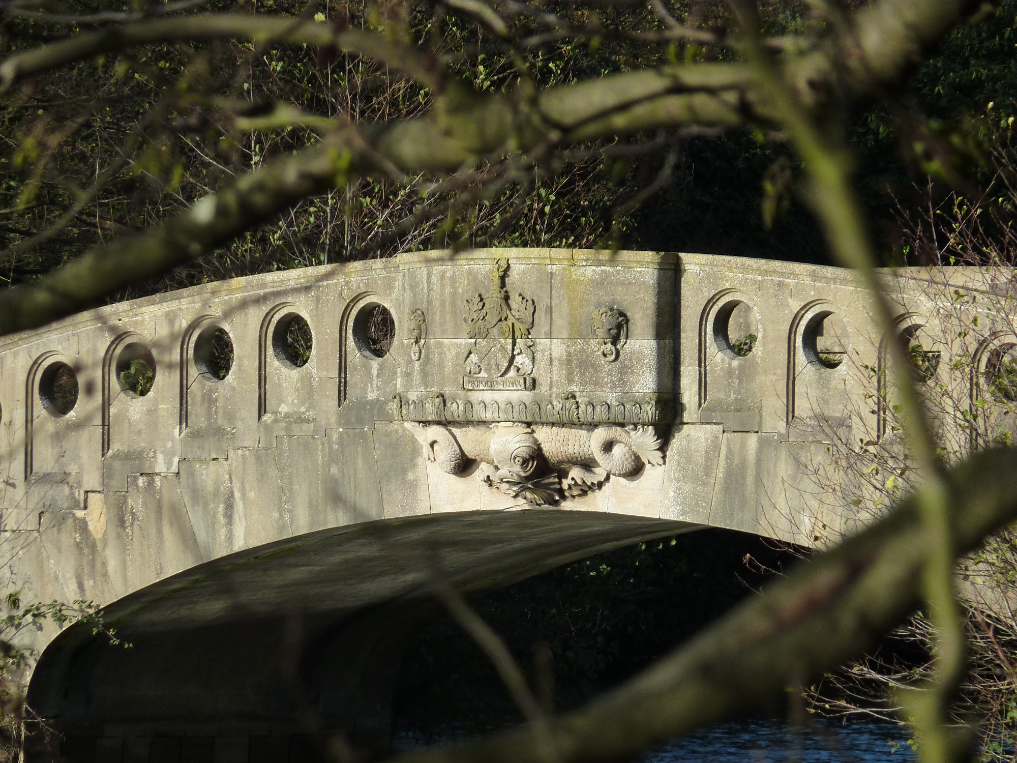 A stone bridge with ornamental carvings.