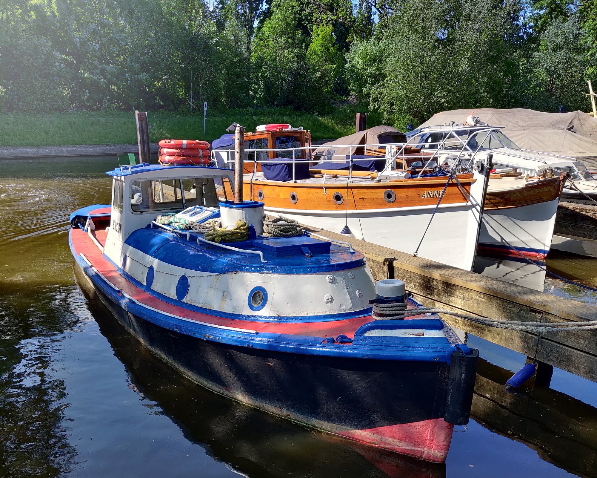 Boats docked at Tom Jones Boatyard.