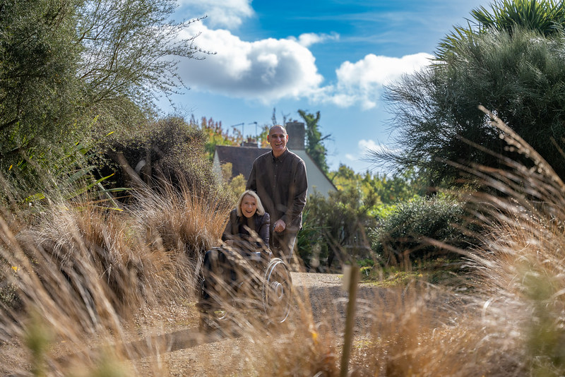 Couple in The Savill Garden. One wheelchair user and one companion.