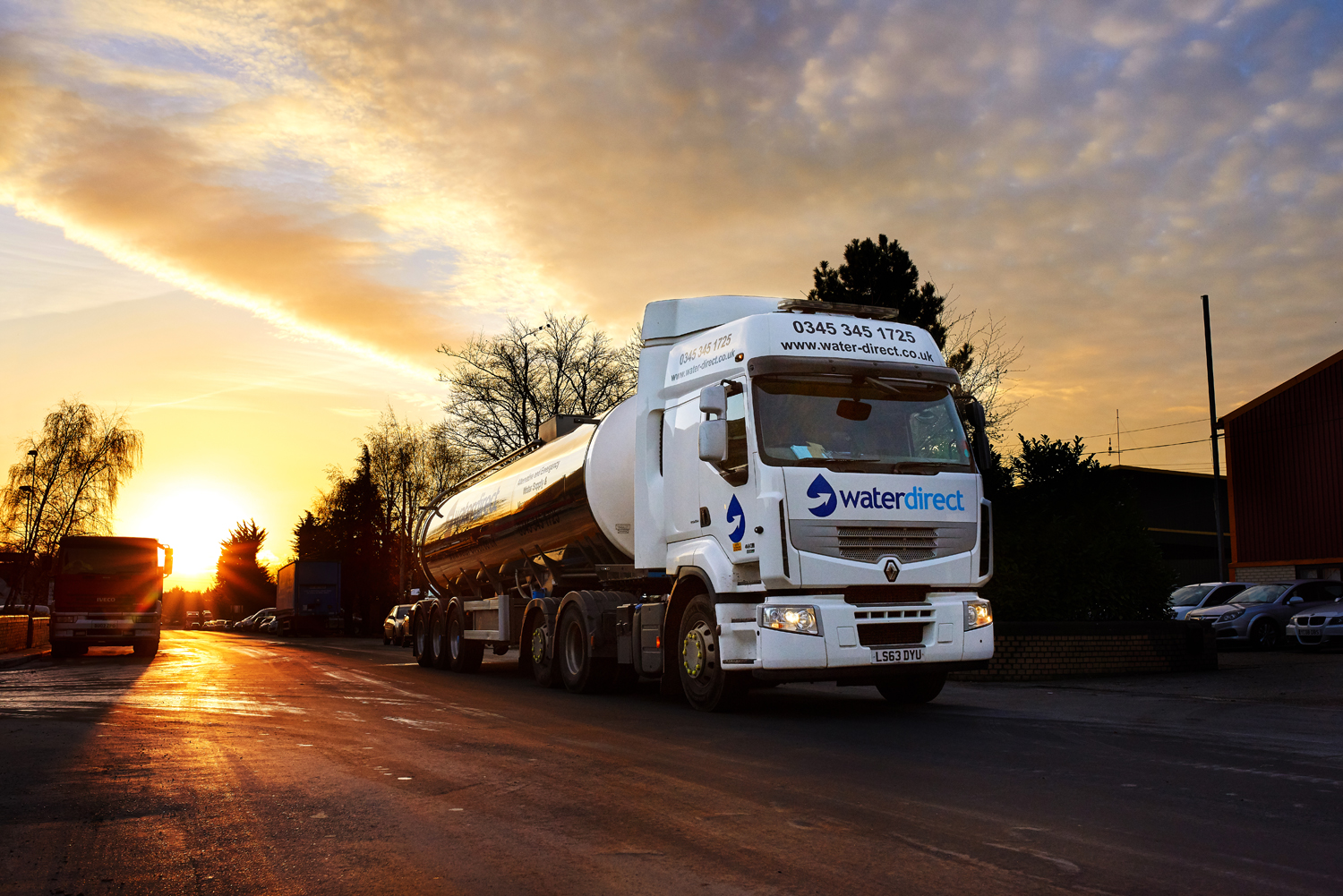 Water Direct 30K tanker with sunset.