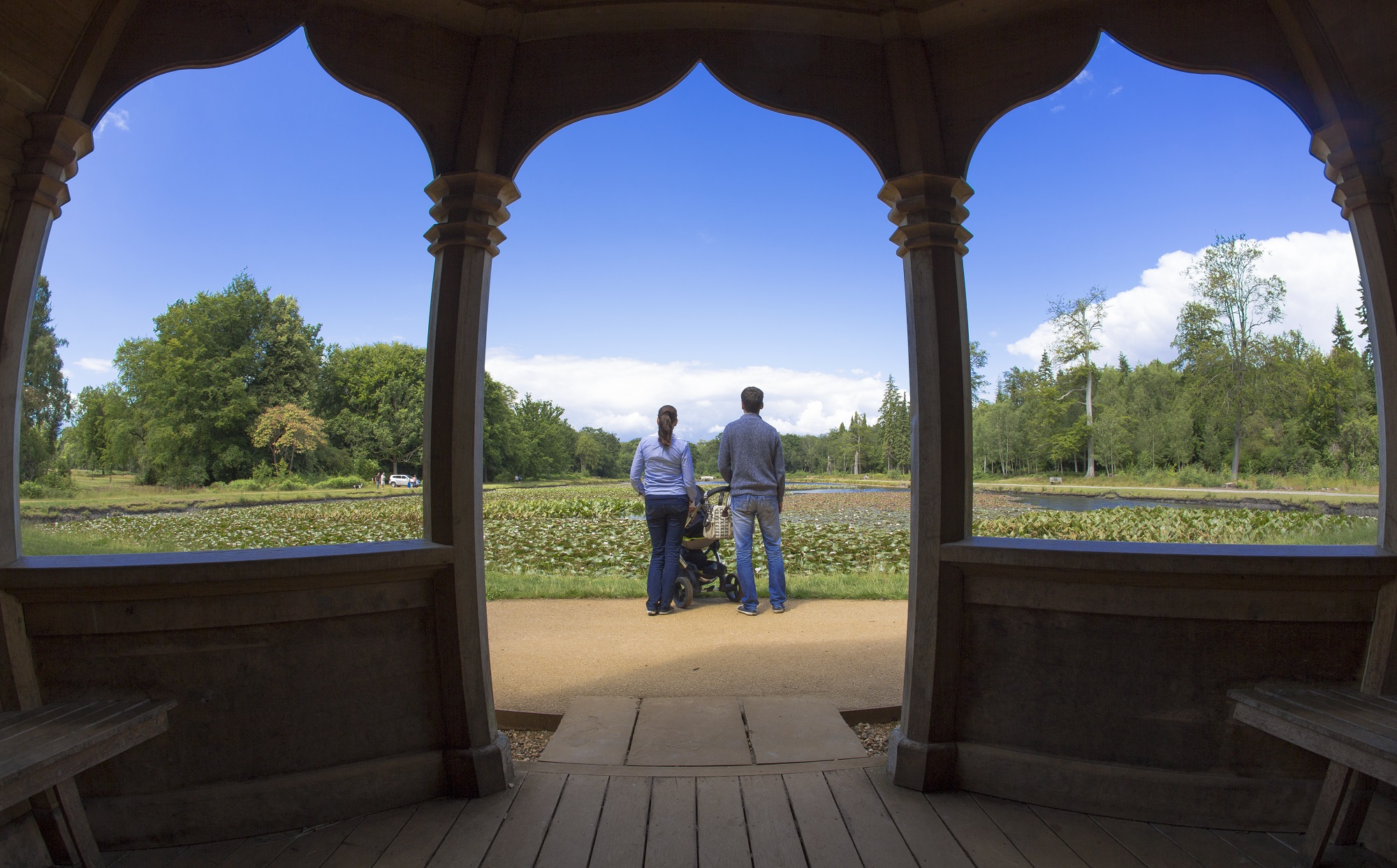 A family take in the view at Cow Pond.