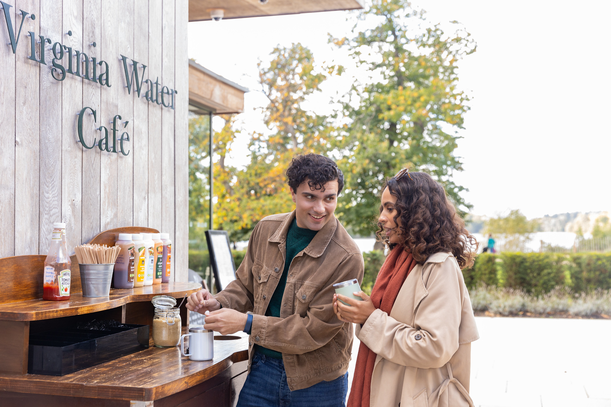 Couple outside the entrance to Virginia Water Café.