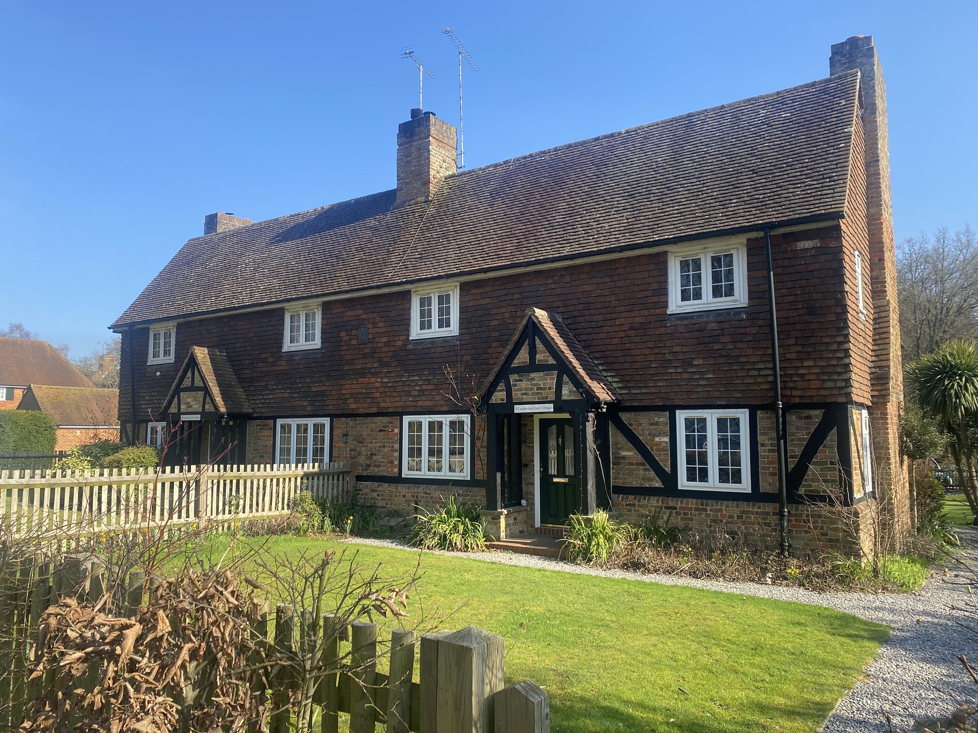 Front view of a property in Windsor Great Park on a sunny day.