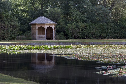 View of the Arbour at Cow Pond with lilies on the water.