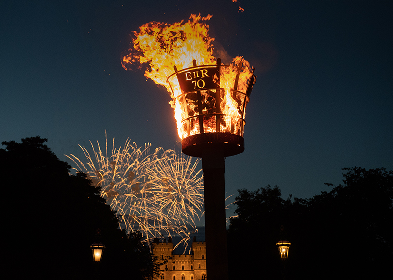 A beacon blazes against the night sky.