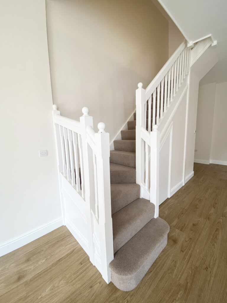 Carpeted staircase in 6 Home Farm, Bagshot Park