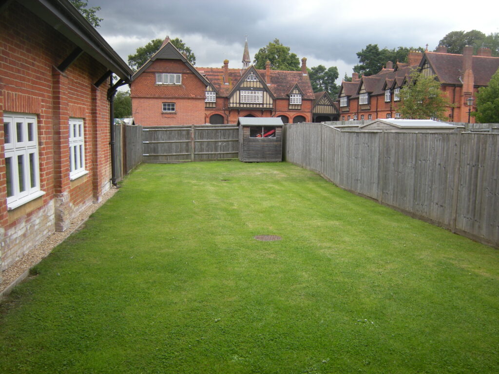 Back view of the garden lawn. 6 Home Farm, Bagshot Park