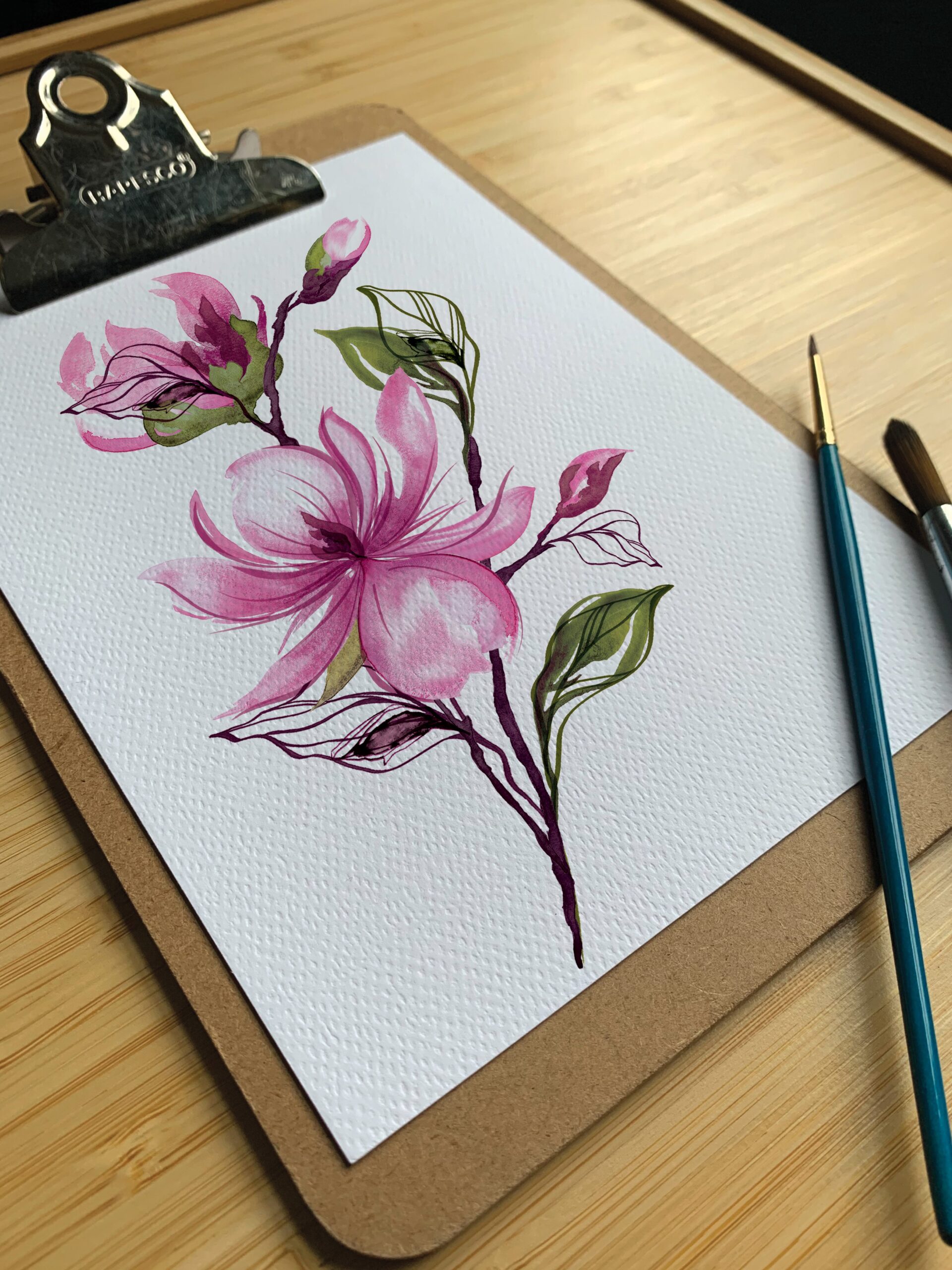 A watercolour drawing of a flower