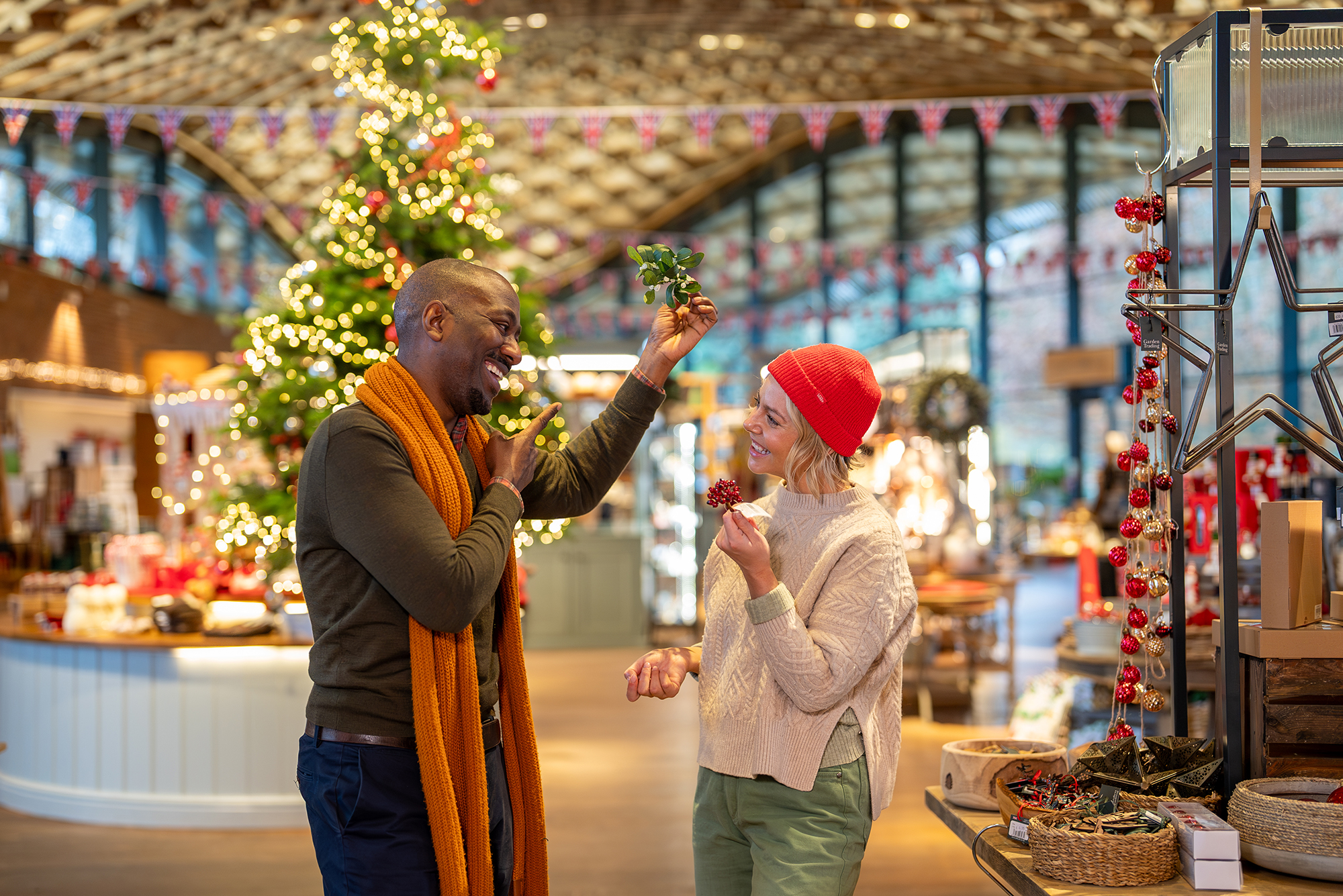 Family from multi ethnic background in Christmas Tree Shop.