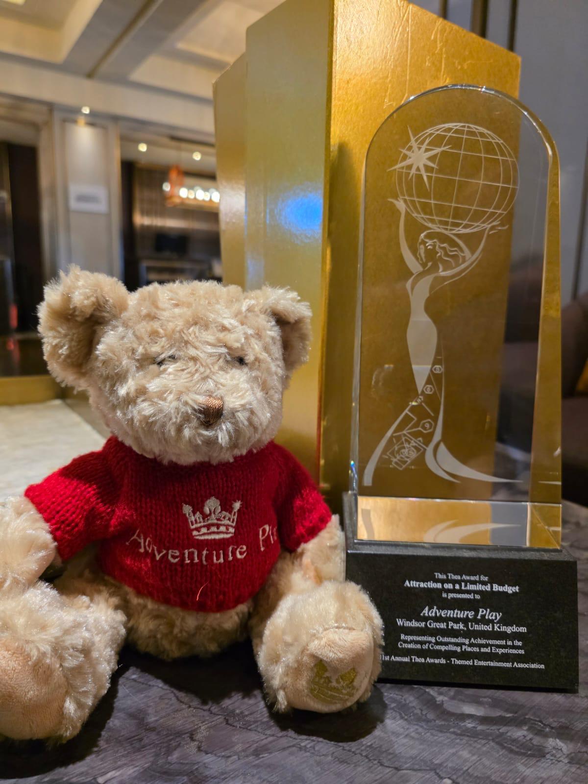 Adventure Play Bear with THEA Award.