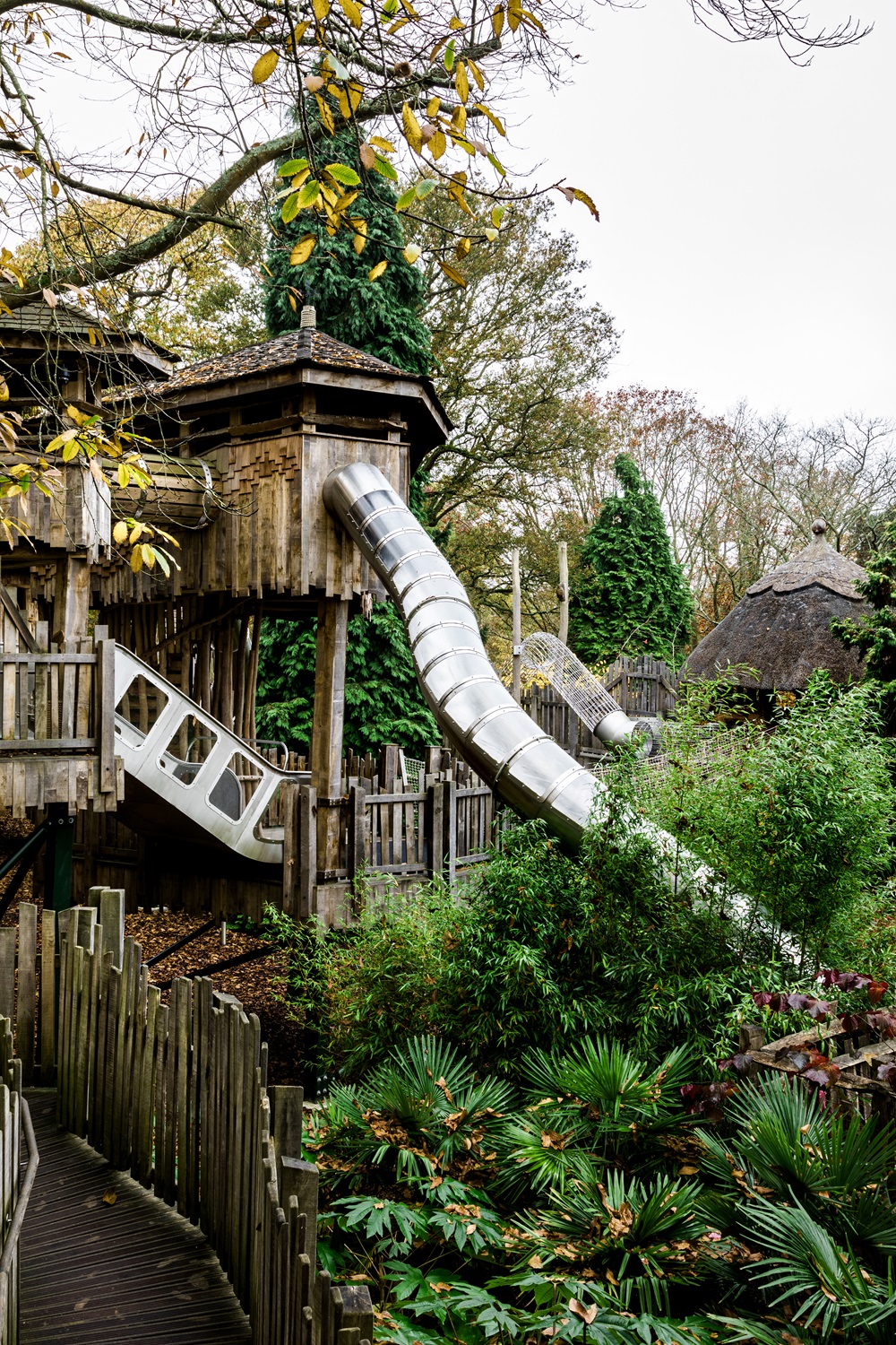 Adventure Play slides and treehouses in the autumn.