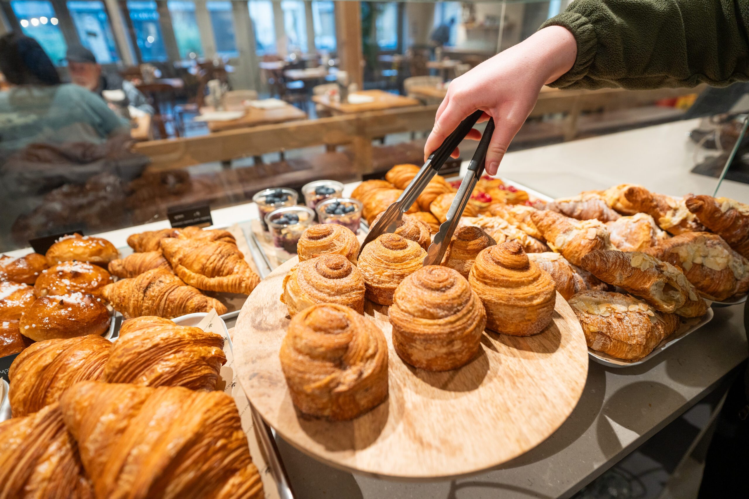 Display of sandwiches and cakes.