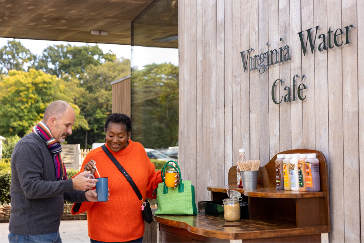 Two people outside the takeaway outlet at the Virginia Water Cafe.