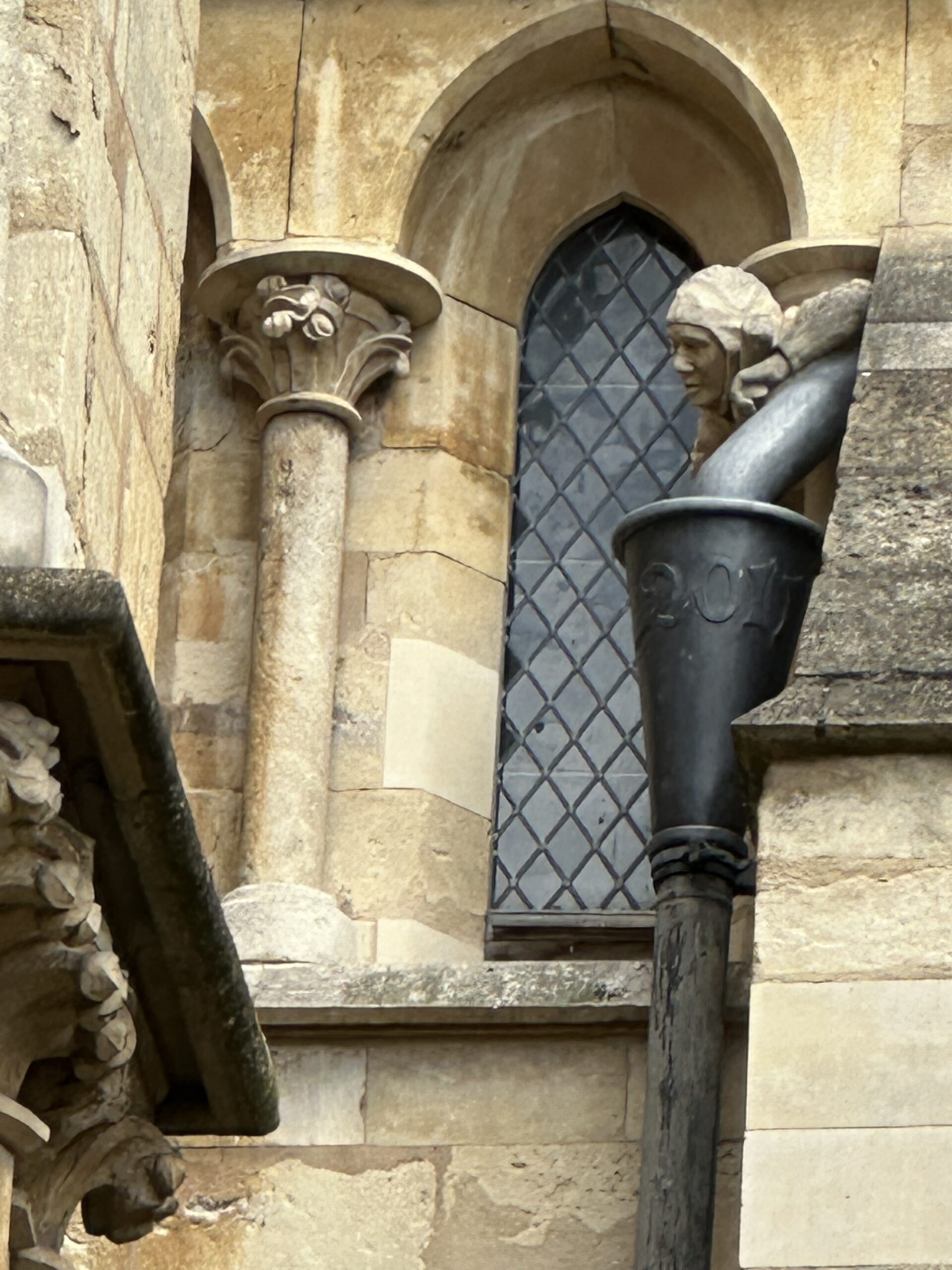 A gargoyle on Lincoln Cathedral in the likeness of a Second World War airman.