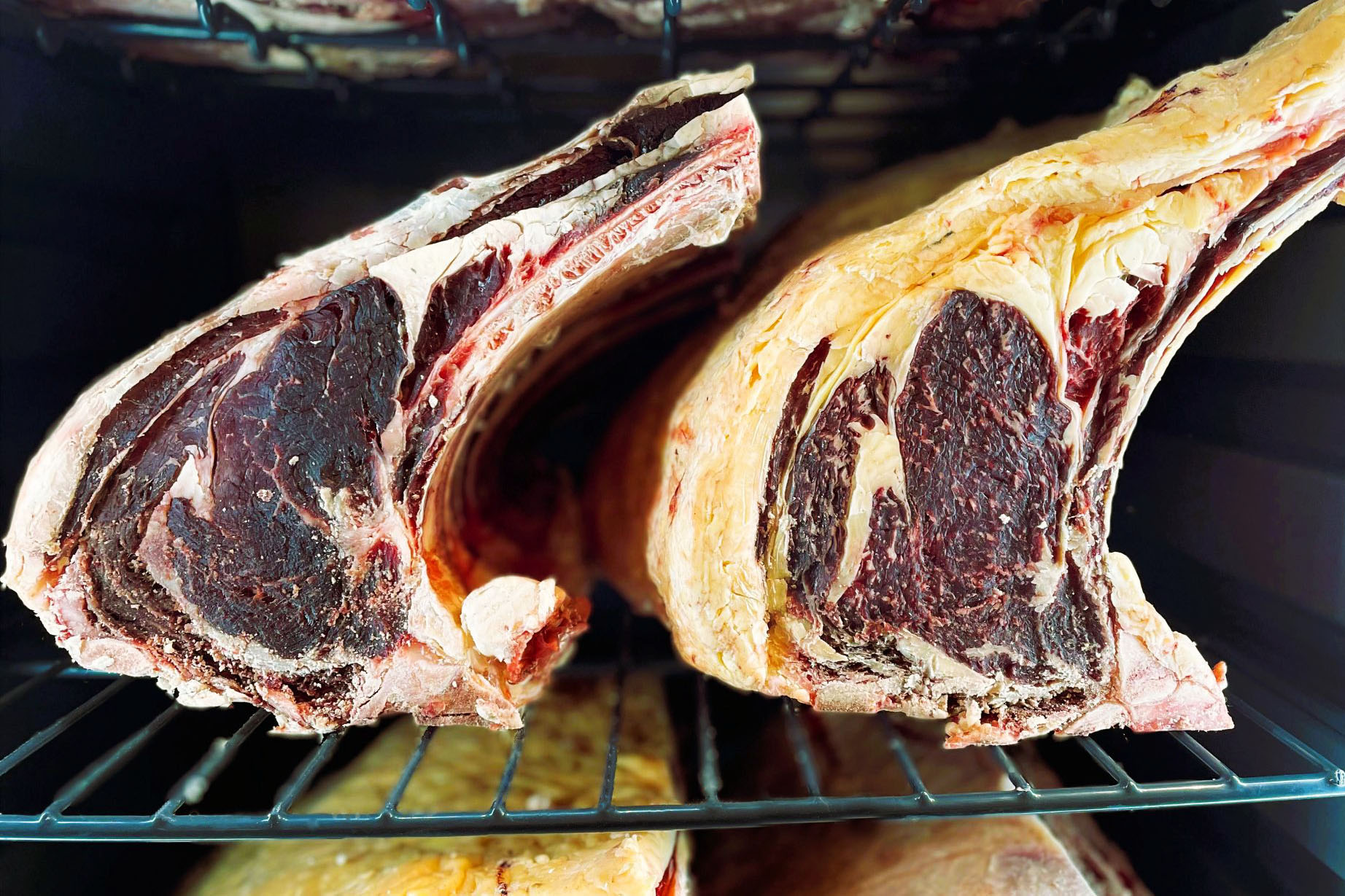 Cuts of beef in a dry-aging fridge.