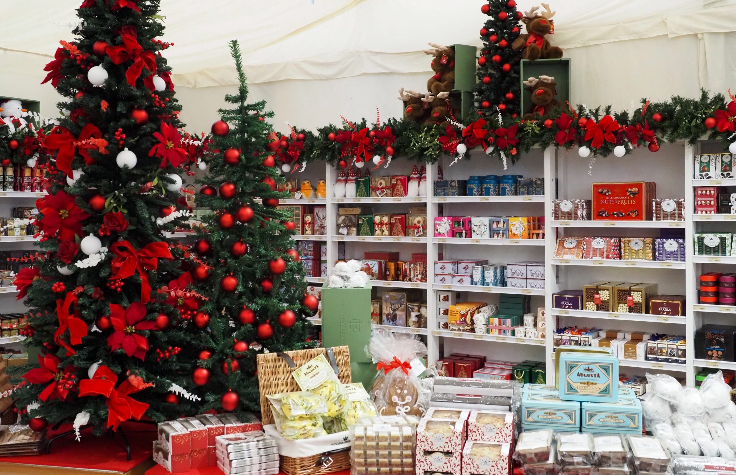 Windsor Farm Shop Christmas Marquee with Christmas decorations and gifting products.