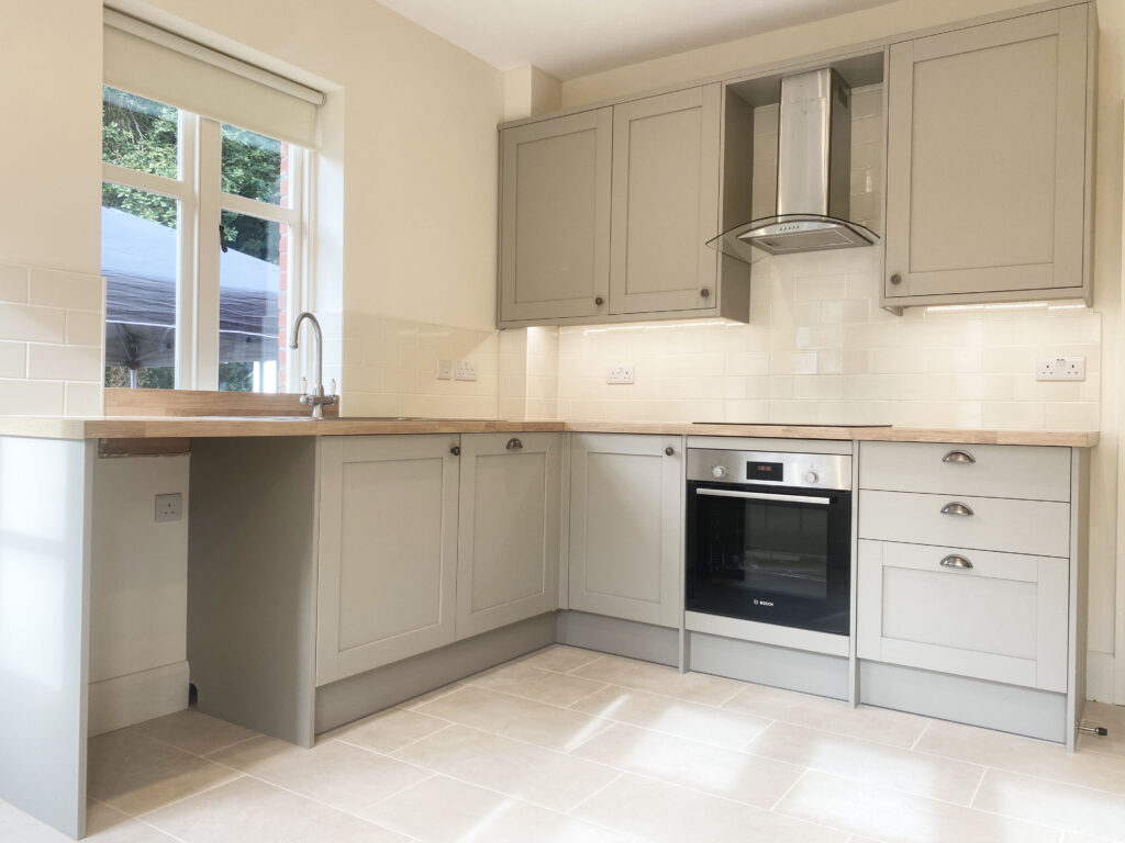 Kitchen showing sink and oven.